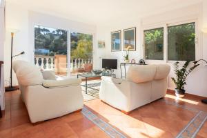 Posezení v ubytování Villa con piscina privada en Begur