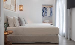 A bed or beds in a room at Agia Anna Living