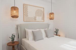 A bed or beds in a room at Agia Anna Living