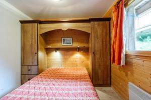 Ένα ή περισσότερα κρεβάτια σε δωμάτιο στο Village gaulois-appt 48r