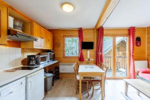 Η κουζίνα ή μικρή κουζίνα στο Village gaulois-appt 48r
