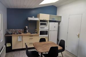 Η κουζίνα ή μικρή κουζίνα στο Appartement Cosy