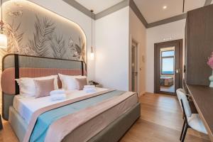 Postel nebo postele na pokoji v ubytování MiraVita Boutique Hotel - Adults Only