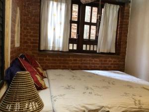 Letto o letti in una camera di Yamba Traditional Home