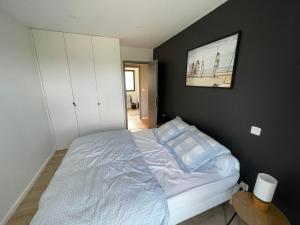 Postel nebo postele na pokoji v ubytování Superbe appartement avec vue sur la foret du Touquet Résidence les Dunes