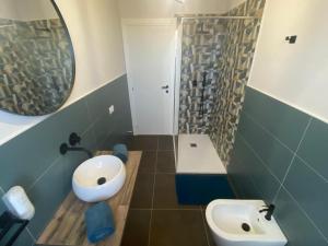 Koupelna v ubytování Inn Alba