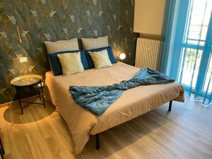 Postel nebo postele na pokoji v ubytování Inn Alba