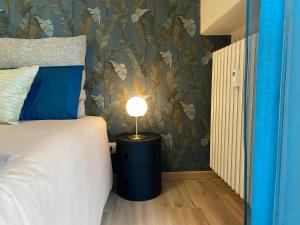 Postel nebo postele na pokoji v ubytování Inn Alba
