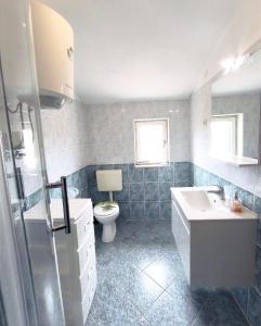 Koupelna v ubytování Apartments Dalmatia