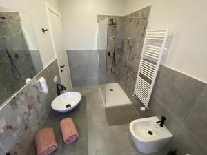 Koupelna v ubytování Inn Alba