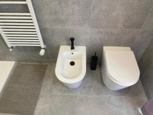 Koupelna v ubytování Inn Alba