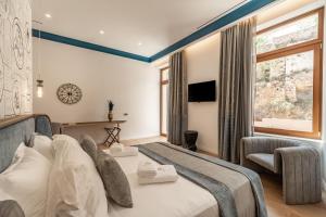 Postel nebo postele na pokoji v ubytování MiraVita Boutique Hotel - Adults Only