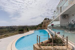 Kolam renang di atau dekat dengan Stunning 3BR home in Gozo with access to pool by 360 Estates