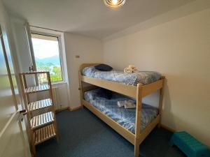 Postel nebo postele na pokoji v ubytování Lake Como Serenity Suite