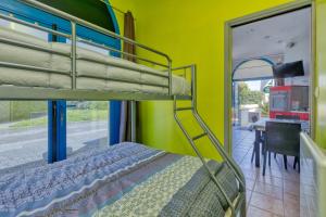 En eller flere senge i et værelse på Jahier Appartement Croisic