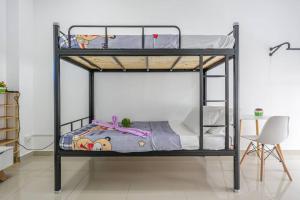 Una cama o camas en una habitación de Airport#F1#KLIA#Mitsui#Transit#INTI#NILAI#SepangF1
