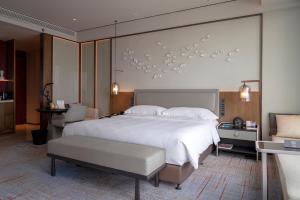 Voodi või voodid majutusasutuse InterContinental Quanzhou by IHG toas