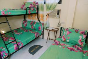 Postel nebo postele na pokoji v ubytování Villa Leonida Resort