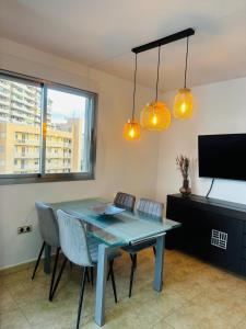 Łóżko lub łóżka w pokoju w obiekcie PRIVILEGIO SANTA CLARA 4A