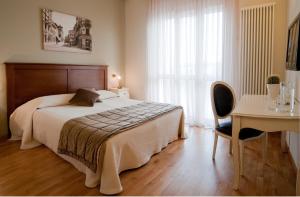 Voodi või voodid majutusasutuse Hotel Belvedere Thiene toas