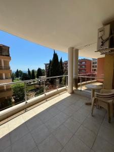 a balcony with a view of a building at Julia Vigo Panorama apartments in Nesebar