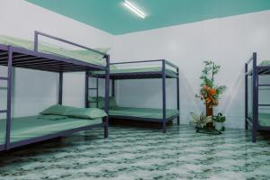Postel nebo postele na pokoji v ubytování Villa Leonida Resort