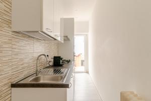A kitchen or kitchenette at La Casa di Nonna