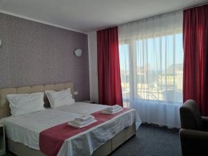 Postel nebo postele na pokoji v ubytování Dani beach Sozopol
