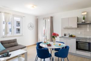 Kuchyň nebo kuchyňský kout v ubytování Apartments Sandra Solitudo II