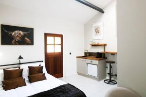 Kuchyň nebo kuchyňský kout v ubytování Copper Cove Cottage + 33 fotografií