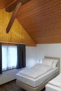 Hotel Jäger Jeuss - Murten - Self-Check-in客房内的一张或多张床位