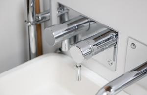 a bathroom sink with a chrome faucet at Central Two Bedroom Apartments with Free Parking in St. Albans