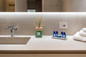 a bathroom counter with a sink and a mirror at Villa Porto Rapallo Portofino Coast in Rapallo +132 photos