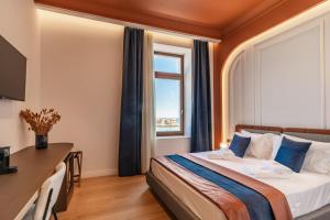 Postel nebo postele na pokoji v ubytování MiraVita Boutique Hotel - Adults Only