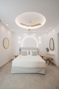 A bed or beds in a room at Agia Anna Living