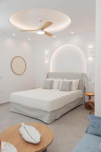 A bed or beds in a room at Agia Anna Living
