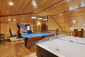 a billiard room with two pool tables at Mystical Creek Pool Lodge #600 in Cosby