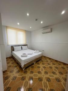 Krevet ili kreveti u jedinici u okviru objekta Onix Apart Hotel