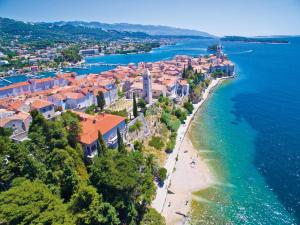 an aerial view of a town on the beach at Apartment Pulić in Rab