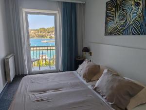 Postel nebo postele na pokoji v ubytování Hotel Dalmacija