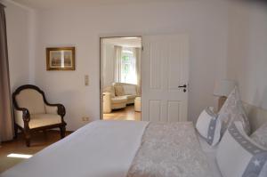 เตียงในห้องที่ Appartement am Oranienpark im Kurviertel +5 ภาพ