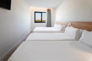 B&B HOTEL Écija客房内的一张或多张床位