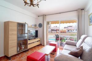 TV a/nebo společenská místnost v ubytování Coronado 148 Apartments Casasol