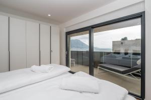 Postel nebo postele na pokoji v ubytování Villa Laganini Apartment 2&4