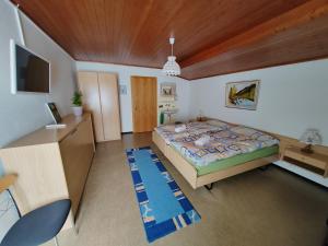 Postel nebo postele na pokoji v ubytování Hotel du Cerf