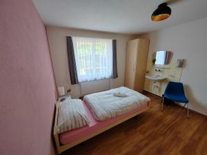 Postel nebo postele na pokoji v ubytování Hotel du Cerf