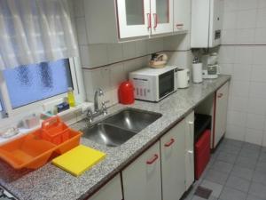 Una cocina o kitchenette en Dreams Apartments