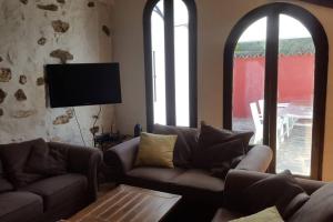 Posezení v ubytování Cortijo Grazalema piscina 5 Hbts con baño AC