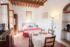 Posteľ alebo postele v izbe v ubytovaní Garden Relais Le Fontanelle