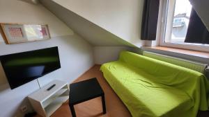 Et sittehjørne på Moderne Studio Apartments und 120qm Wohnungen in Oberhausen, ideal für Geschäftsreisende und Monteure